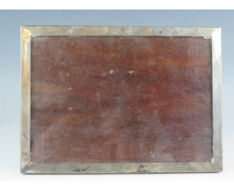 A George V silver easel photograph frame of rectangular outline, maker Sanders &amp; Mackenzie Birmingham, 1930, initialled, 