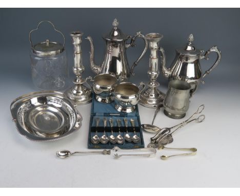 A plated four-piece tea and coffee service of ovoid outline, with foliate capped scroll handles, a plated swing-handled servi