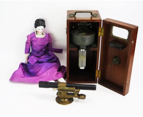 A hand held bubble compass, contained in a fitted wood case, together with a lacquered brass and anodised level, 23cm long an