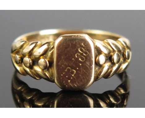 A Victorian 18ct Gold Keeper Signet Ring, Birmingham 1898, maker CYBS, panel engraved EB 1889, size O.25, c. 4.2g 