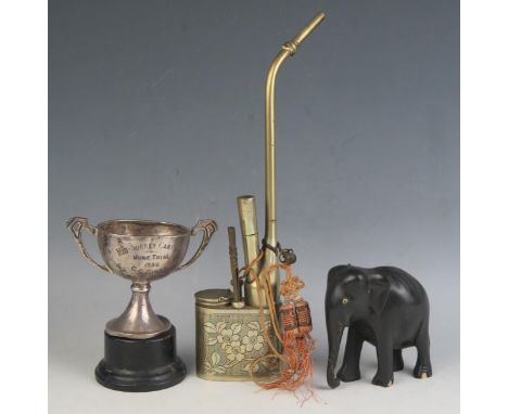 A George V silver twin handled trophy cup, inscribed, 8cm high, 48gms, 1,54ozs, a Chinese opium pipe, and an ebony model of a