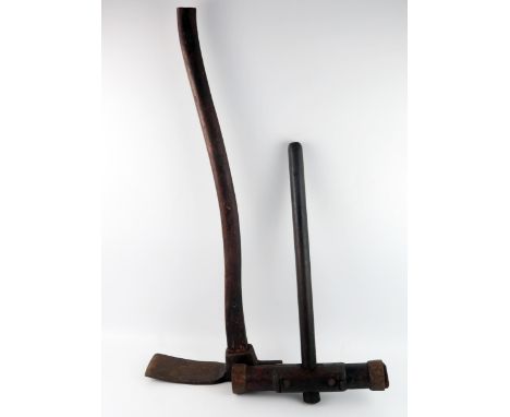 A shipwright's adze with 8.5cm blade, mounted on a fruit wood handle and a caulking mallet. (2). 