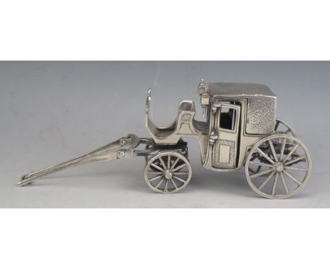 A Brumm white metal model of a horse drawn coach, with spoke wheels and opening doors, 15cm long, 144gms 4.64ozs 