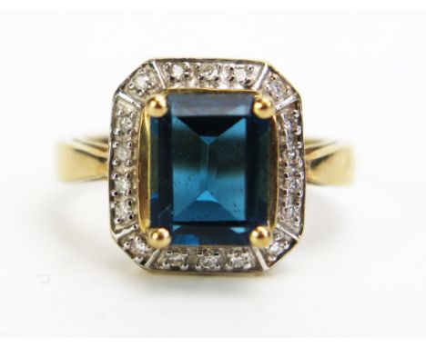 A 9ct Gold, Blue Topaz and Diamond Dress Ring, 13x12mm head, size N, c. 4.16g 