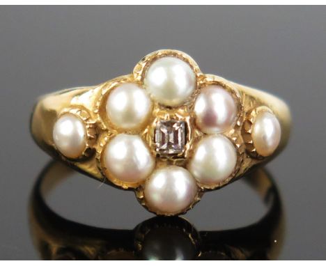 An untested Pearl and Diamond Ring in an unmarked precious yellow metal setting, 16x12mm head, KEE tested as 18ct, size M.5, 