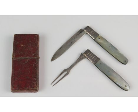 A George III silver travelling knife and fork set, maker IT possibly John Tatum I, London, with folding blade and tines, with