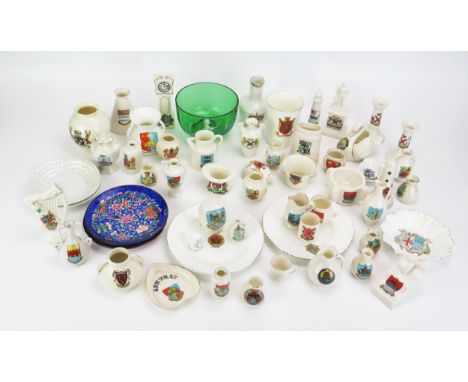 A collection of crested china wares, includes Goss, Arcadian, and others, together with a Mary Gregory style green glass bowl