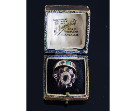 An Antique Foil Backed Garnet and untested Pearl Cluster Ring in an unmarked precious yellow metal setting, 18x15mm head (KEE