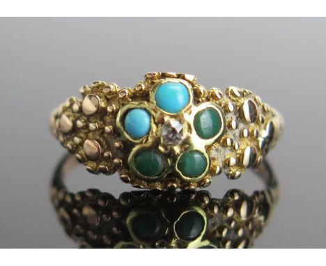 A Victorian Turquoise and Old Cut Diamond Ring in an unmarked yellow metal setting, KEE tested as 9ct replacement shank and 1