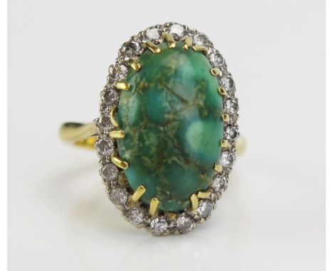 An 18ct Gold, Diamond and Turquoise Oval Cluster Ring, 22x15mm head, c. 2mm diamonds, size M.5, c. 8.42g 