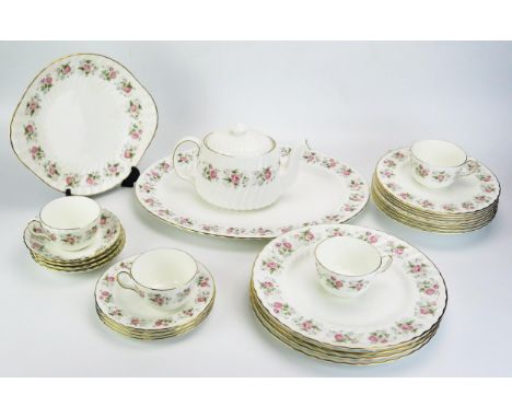 A Minton part tea and dinner service with "Spring Bouquet" pattern decoration, includes meat plate, dinner plates, side plate