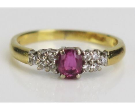 An 18ct Gold, Ruby and Diamond Ring, c. 4.8x3.8mm principal stone, size K.5, c. 2.54g 