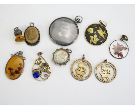 Ten Pendants including a silver and enamel 3d 