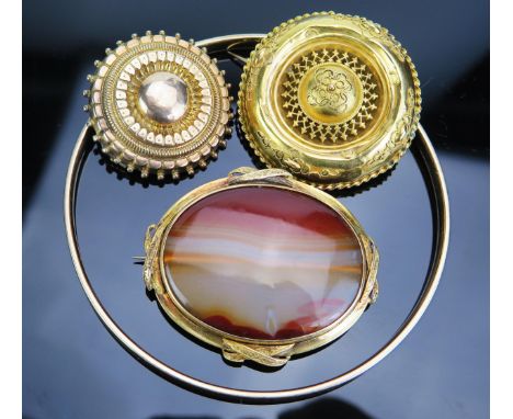 A 9ct Gold Bangle with metal core, two Victorian yellow metal memorial brooches and agate brooch 
