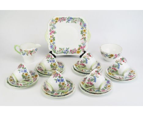 A Shelley bone china six setting tea service with transfer print "Hedgerow" decoration, includes six cups, six saucers, six s