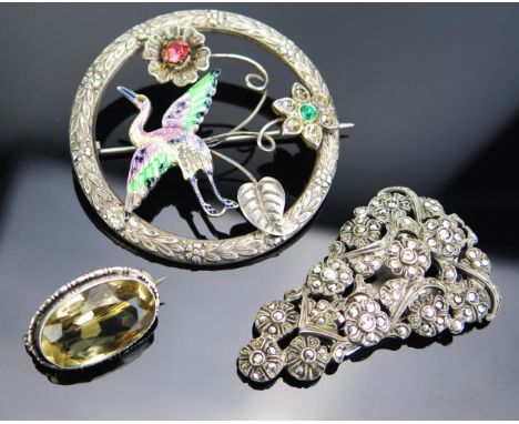 A Sterling Silver and Enamel Stork Brooch (48mm diam.), silver and marcasite clip and a brooch 