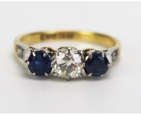 A Sapphire and Old Cushion Cut Diamond Three Stone Ring in an 18ct and platinum setting, diamond c. 4.7mm diam., size J.5 