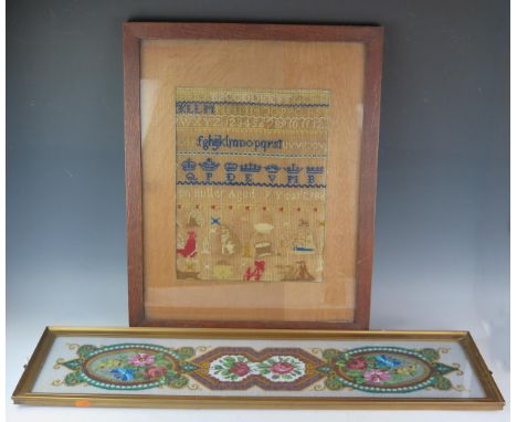 A Victorian woolwork banded sampler, with upper and lower  case alphabets, Arabic numerals, crowns and coronets, worked in co