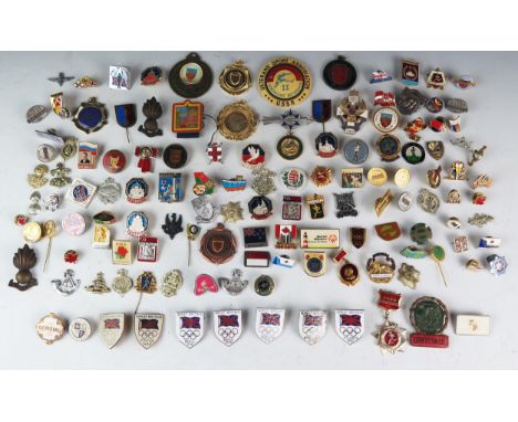 A large collection of metal and enamel lapel badges many relating to modern Olympic games including Seoul, Rome, Sydney and o