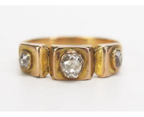 A Victorian Old Cut Diamond Three Stone Ring in a precious yellow metal setting, c. 4.5x4mm central stone, size O.25, KEE tes