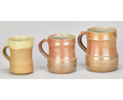 RAY FINCH (1914-2012) for Winchcombe Pottery; a salt glazed mug with incised decoration, impressed WP. mark, height 12cm, a s