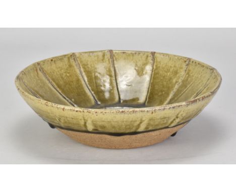 RICHARD BATTERHAM (1936-2021); an early stoneware star bowl partially covered in green ash glaze, diameter 25cm. (D)Additiona