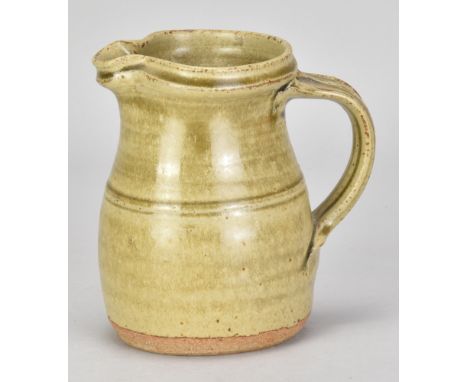RICHARD BATTERHAM (1936-2021); a stoneware jug covered in green ash glaze, height 13.5cm. (D)Additional InformationAppears go