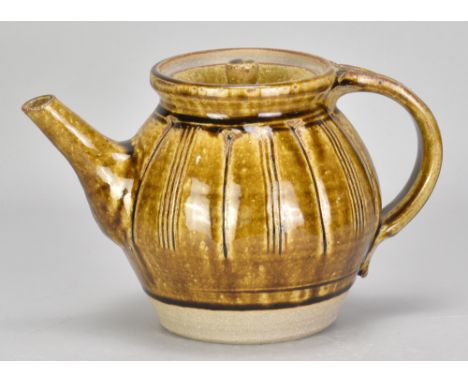 MIKE DODD (born 1943); a stoneware teapot covered in granite and iron glaze with incised decoration, impressed MJD mark, heig