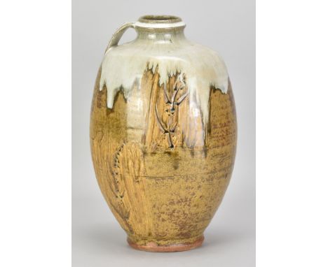 JIM MALONE (born 1946); a large stoneware bottle with side handle covered in ochre glaze with nuka top and incised decoration