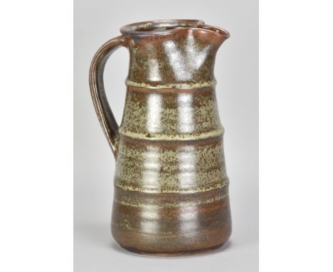 DAVID LEACH (2011-2005) for Lowerdown Pottery; a stoneware pitcher with pronounced ribs covered in mottled grey and kaki glaz