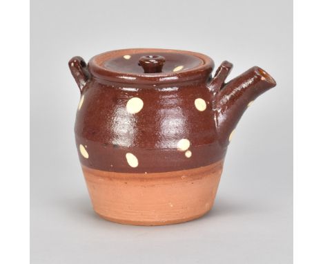 WILLIAM MARSHALL (1923-2007); a slipware teapot partially covered in iron rich glaze decorated with yellow spots, impressed W