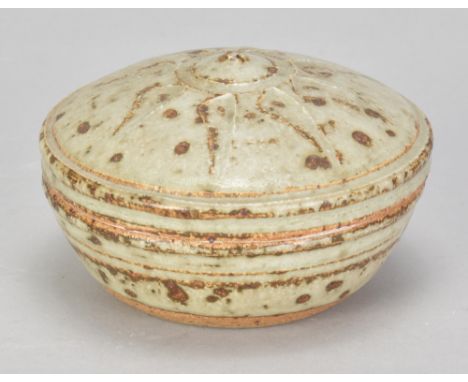 RICHARD BATTERHAM (1936-2021); a stoneware box and cover covered in green ash glaze, diameter 9cm. (D)Additional InformationA