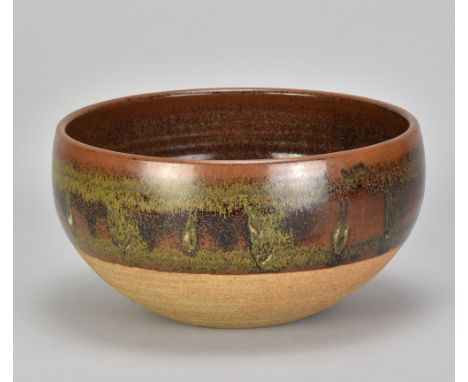 Attributed to RAY FINCH (1914-2012) for Winchcombe Pottery; a deep stoneware bowl partially covered in iron rich glaze decora