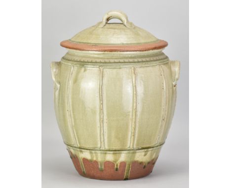 RICHARD BATTERHAM (1936-2021); a medium ribbed stoneware beer jar and cover partially covered in green ash glaze, height 37cm