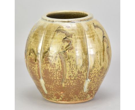 JIM MALONE (born 1946); a lobed stoneware jar covered in green ash and iron glaze with nuka top and combed decoration, impres