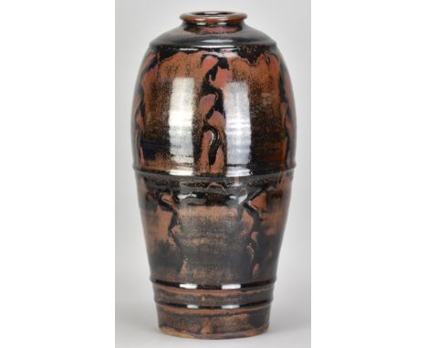 JIM MALONE (born 1946); a large stoneware bottle covered tenmoku glaze over red slip with incised decoration, impressed JM an