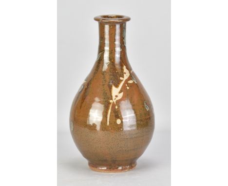 JIM MALONE (born 1946); a stoneware Korean bottle covered in kaki glaze with wax resist decoration and splashes of nuka, impr