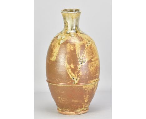 JIM MALONE (born 1946); a large stoneware bottle covered in green ash and iron glaze with nuka top and incised decoration, im