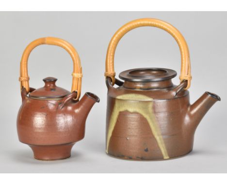 JOHN & KATE TURNER; a stoneware teapot with cane handle covered in iron rich glaze with poured decoration, incised T mark, he