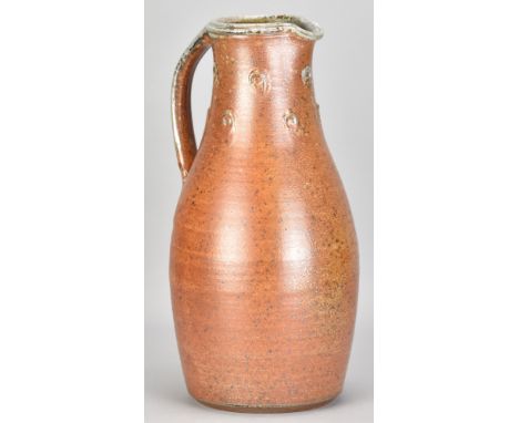 JOHN JELFS (born 1946); a tall salt glazed pitcher with grey ash top and impressed decoration to the neck, impressed JJ mark,