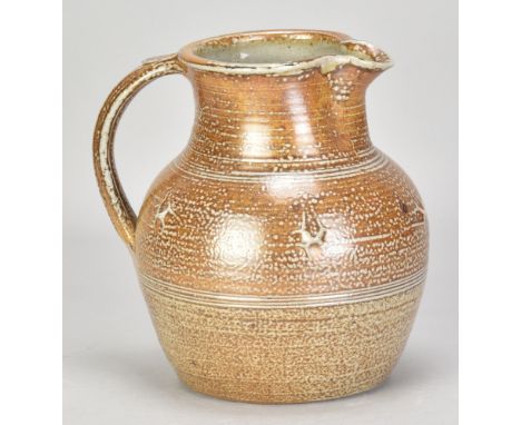 RAY FINCH (1914-2012) for Winchcombe Pottery; a salt glazed jug with pinched decoration, impressed WP. mark, height 19cm. (D)