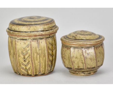 MIKE DODD (born 1943); a stoneware caddy covered in green ash and granite glaze with impressed and incised decoration, impres
