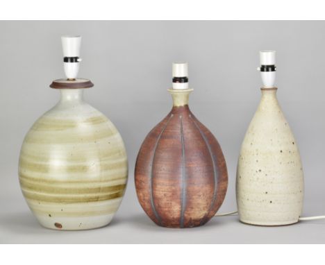 DAVID HEMINSLEY (1927-2007); a stoneware lamp base covered in grey glaze washed with bands of iron, impressed DH mark, height