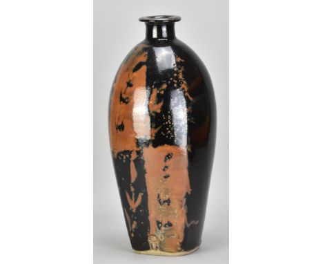 JIM MALONE (born 1946); a large stoneware bottle covered in tenmoku and kaki glaze with wax resist decoration, impressed JM a