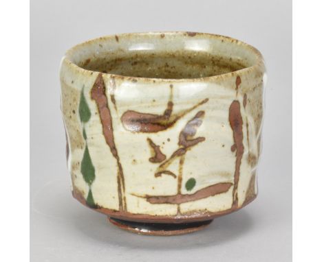 CARSON CULP for Leach Pottery; a stoneware yunomi partially covered in brushed slip with iron and copper green decoration, im