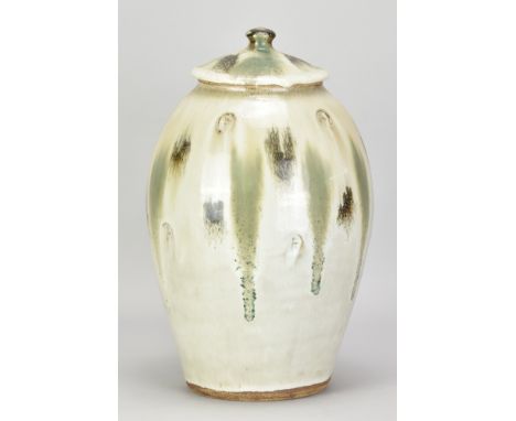 JIM MALONE (born 1946); a tall stoneware jar and cover covered in nuka glaze with copper green and iron pours and impressed d