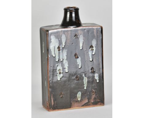 JIM MALONE (born 1946); a large stoneware slab bottle covered in tenmoku breaking to kaki glaze with copper green pours and i