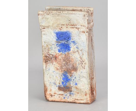 ROBIN WELCH (1936-2019); a rectangular stoneware slab form with winged top and textured surface covered in white glaze with b