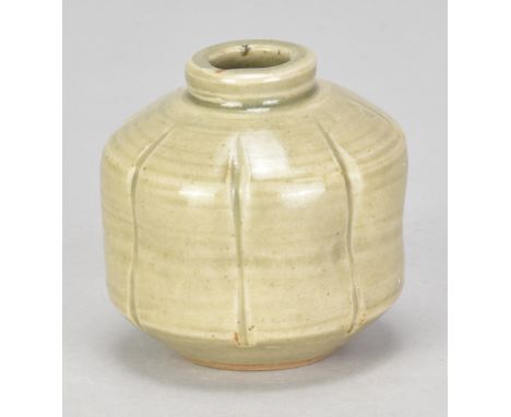 WILLIAM MARSHALL (1923-2007) for Leach Pottery; a small stoneware bud vase covered in celadon glaze with incised decoration, 