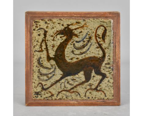 Leach Pottery; a square stoneware tile decorated with a griffin, painted pottery mark, 10 x 10cm, framed.Additional Informati